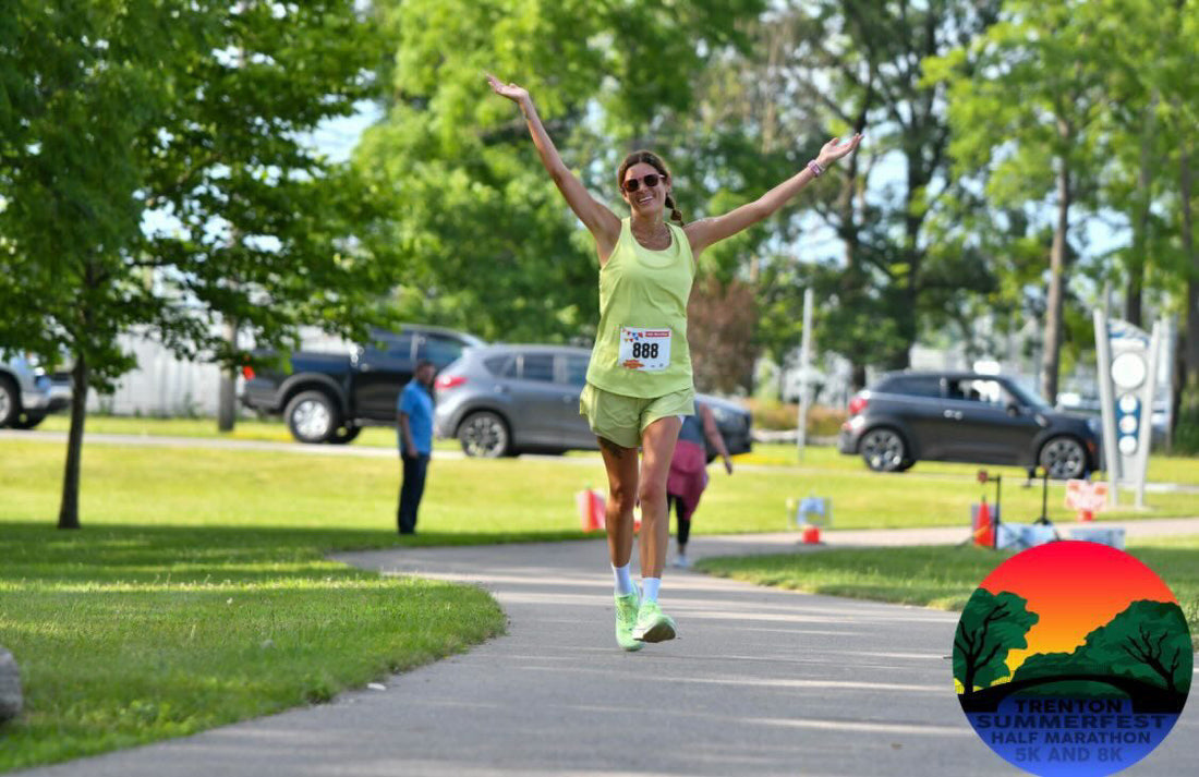 Runner finishing a half marathon race, illustrating key half marathon tips for first-timers