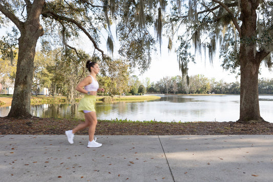 Average female running wearing EMIE outfit