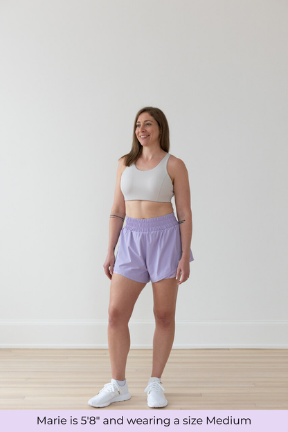 Size comparison for EMIÉ oat milk forget about it bra - women's running shorts available XS to XXL