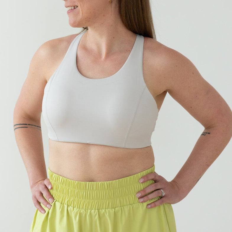 Close-up of EMIÉ oat milk sports bra band and fit - women's running bra with full coverage